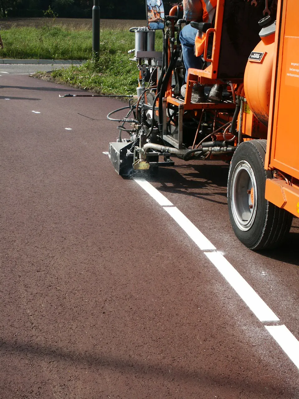 Medewerkers met machine